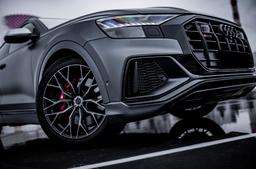 Concaver CVR1 Black alloy wheel mounted on car in an atmospheric setting