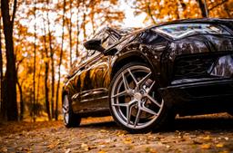 Concaver CVR2 Silver alloy wheel mounted on car in an atmospheric setting