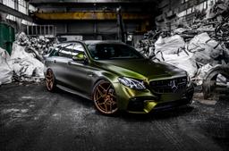 Concaver CVR2 Bronze alloy wheel mounted on car in an atmospheric setting