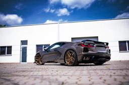 Concaver CVR2 Bronze alloy wheel mounted on car in an atmospheric setting