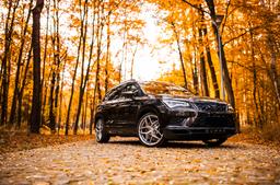 Concaver CVR2 Silver alloy wheel mounted on car in an atmospheric setting