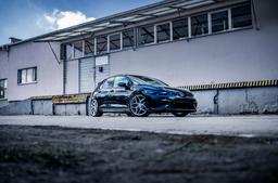 Concaver CVR2 Silver alloy wheel mounted on car in an atmospheric setting