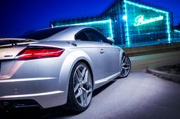 Concaver CVR2 Silver alloy wheel mounted on car in an atmospheric setting