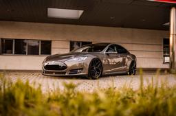 Concaver CVR2 Grey alloy wheel mounted on car in an atmospheric setting