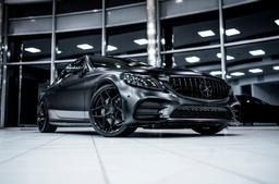 Concaver CVR2 Black alloy wheel mounted on car in an atmospheric setting