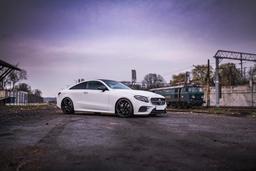 Concaver CVR2 Black alloy wheel mounted on car in an atmospheric setting