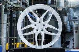 Concaver CVR3 Custom alloy wheel mounted on car in an atmospheric setting