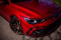 Concaver CVR3 Bronze alloy wheel mounted on car in an atmospheric setting