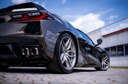 Concaver CVR3 Silver alloy wheel mounted on car in an atmospheric setting