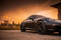 Concaver CVR3 Black alloy wheel mounted on car in an atmospheric setting