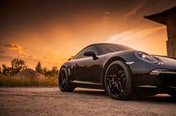 Concaver CVR3 Black alloy wheel mounted on car in an atmospheric setting