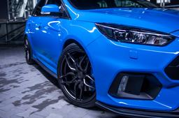 Concaver CVR3 Grey alloy wheel mounted on car in an atmospheric setting