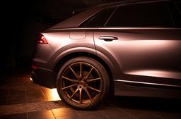 Concaver CVR4 Bronze alloy wheel mounted on car in an atmospheric setting