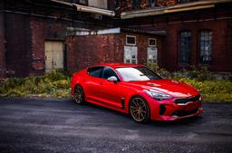 Concaver CVR4 Bronze alloy wheel mounted on car in an atmospheric setting