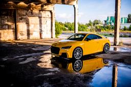 Concaver CVR4 Silver alloy wheel mounted on car in an atmospheric setting