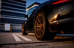 Concaver CVR4 Bronze alloy wheel mounted on car in an atmospheric setting