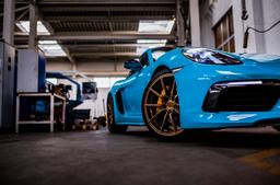 Concaver CVR4 Bronze alloy wheel mounted on car in an atmospheric setting