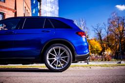 Concaver CVR4 Silver alloy wheel mounted on car in an atmospheric setting