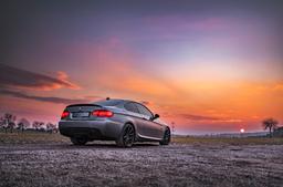 Concaver CVR4 Grey alloy wheel mounted on car in an atmospheric setting