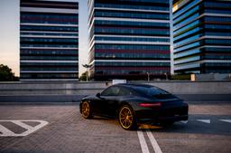 Concaver CVR4 Bronze alloy wheel mounted on car in an atmospheric setting