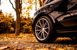 Concaver CVR4 Silver alloy wheel mounted on car in an atmospheric setting
