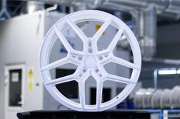 Concaver CVR5 Custom alloy wheel mounted on car in an atmospheric setting