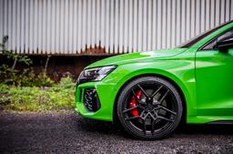 Concaver CVR5 Black alloy wheel mounted on car in an atmospheric setting