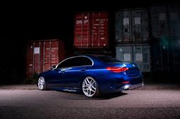 Concaver CVR5 Silver alloy wheel mounted on car in an atmospheric setting