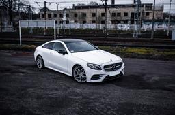 Concaver CVR5 Silver alloy wheel mounted on car in an atmospheric setting