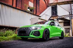 Concaver CVR5 Black alloy wheel mounted on car in an atmospheric setting