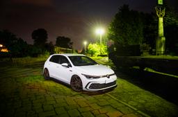 Concaver CVR5 Bronze alloy wheel mounted on car in an atmospheric setting
