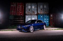 Concaver CVR5 Silver alloy wheel mounted on car in an atmospheric setting