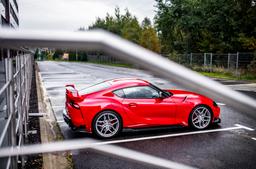 Concaver CVR5 Silver alloy wheel mounted on car in an atmospheric setting