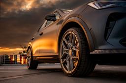 Concaver CVR5 Silver alloy wheel mounted on car in an atmospheric setting