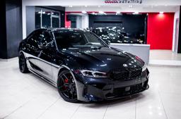 Concaver CVR5 Black alloy wheel mounted on car in an atmospheric setting