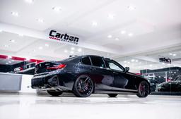 Concaver CVR5 Black alloy wheel mounted on car in an atmospheric setting