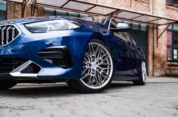 Concaver CVR6 Silver alloy wheel mounted on car in an atmospheric setting