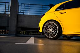 Concaver CVR6 Silver alloy wheel mounted on car in an atmospheric setting