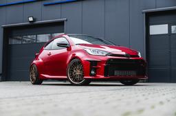 Concaver CVR6 Bronze alloy wheel mounted on car in an atmospheric setting