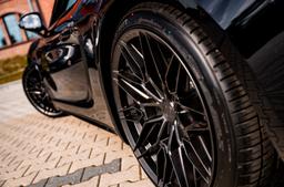 Concaver CVR6 Grey alloy wheel mounted on car in an atmospheric setting