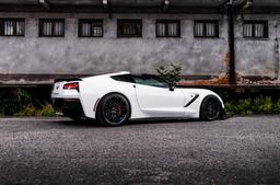 Concaver CVR6 Black alloy wheel mounted on car in an atmospheric setting