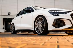 Concaver CVR6 Silver alloy wheel mounted on car in an atmospheric setting