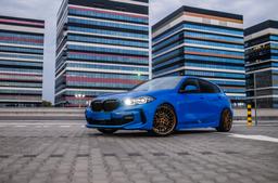 Concaver CVR6 Bronze alloy wheel mounted on car in an atmospheric setting