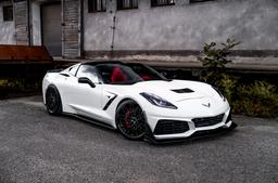 Concaver CVR6 Black alloy wheel mounted on car in an atmospheric setting