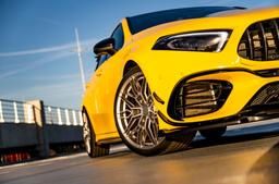 Concaver CVR6 Silver alloy wheel mounted on car in an atmospheric setting
