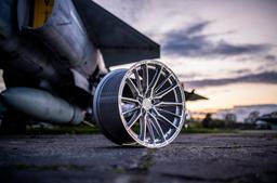 Concaver CVR7 Silver alloy wheel mounted on car in an atmospheric setting