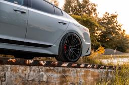 Concaver CVR7 Black alloy wheel mounted on car in an atmospheric setting