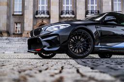 Concaver CVR7 Black alloy wheel mounted on car in an atmospheric setting