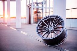 Concaver CVR7 Silver alloy wheel mounted on car in an atmospheric setting