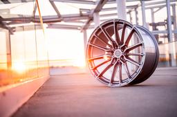 Concaver CVR7 Silver alloy wheel mounted on car in an atmospheric setting